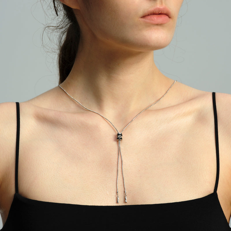 OINICIO Sediment Black Resin Wheel Pendant Necklace