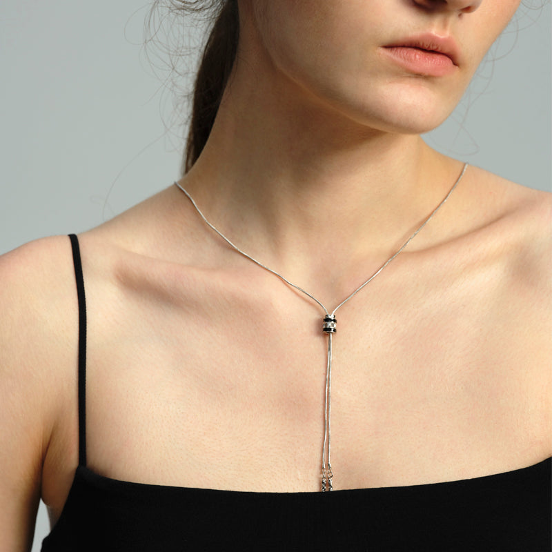 OINICIO Sediment Black Resin Wheel Pendant Necklace