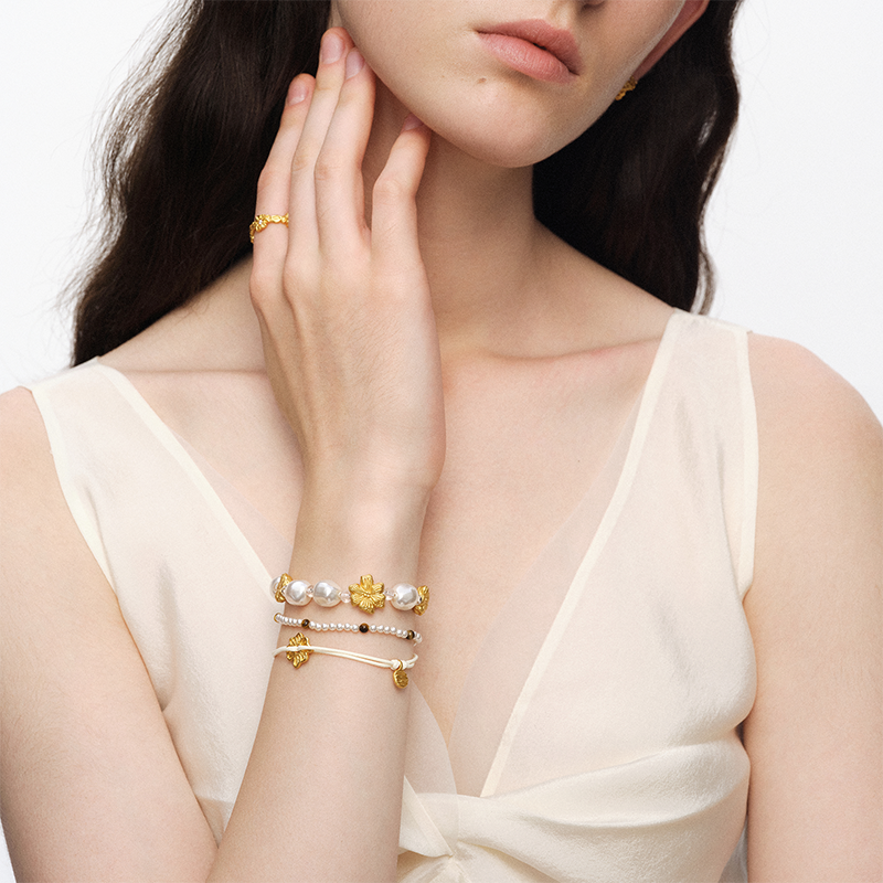 OINICIO NanKe Gold Floral Pearl Braided Bracelet